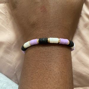 black white and purple bracelet